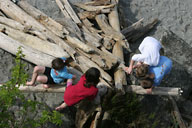 Kids playing on beach at Carkeek Park, Seattle, WA